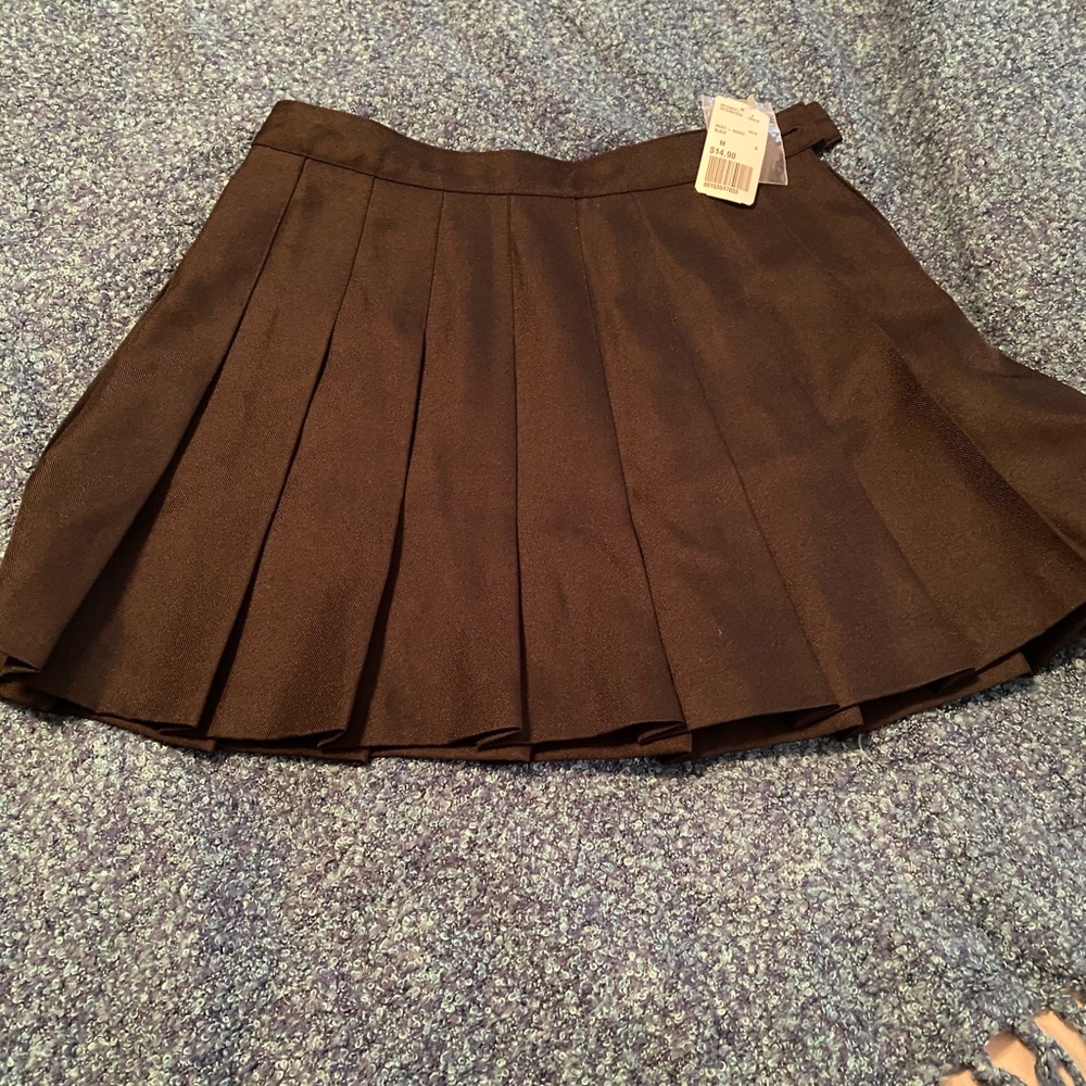 Black pleated mini skirt